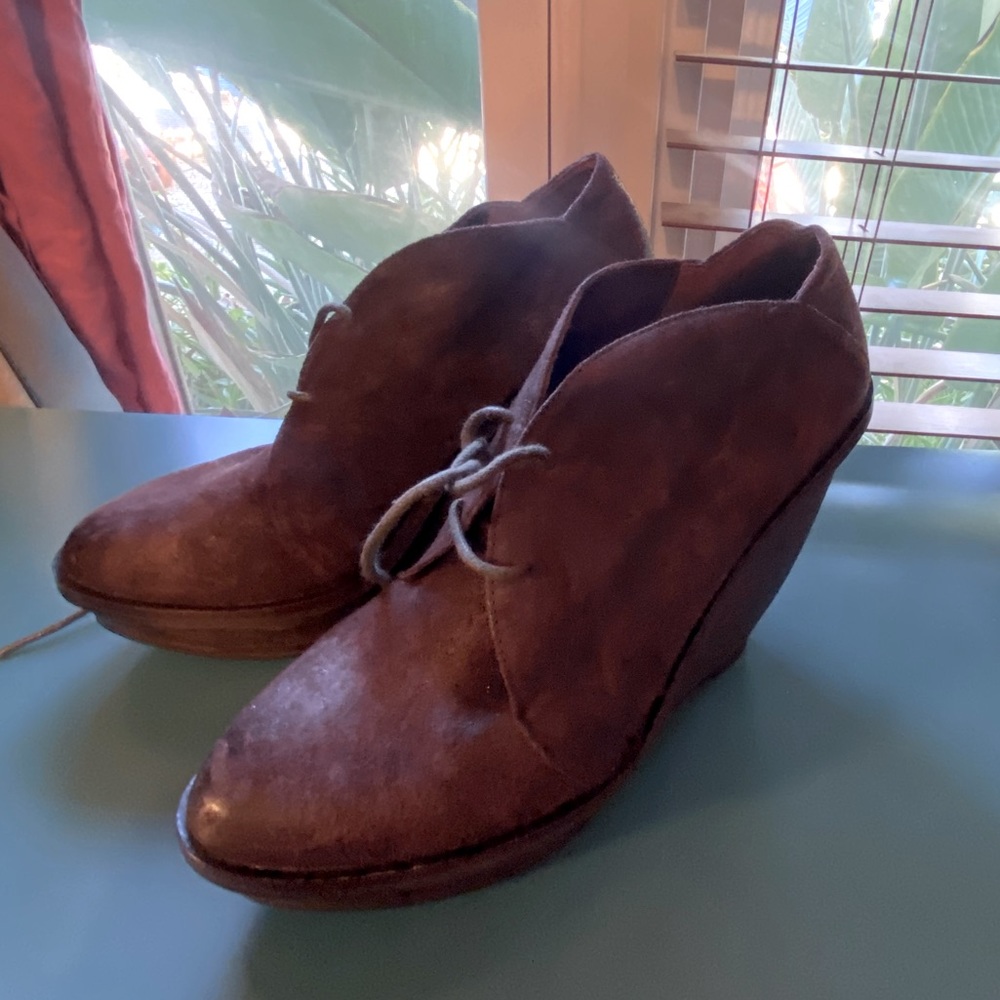 Brown high heel shoes. Made to look worn. Brand new,nvr worn